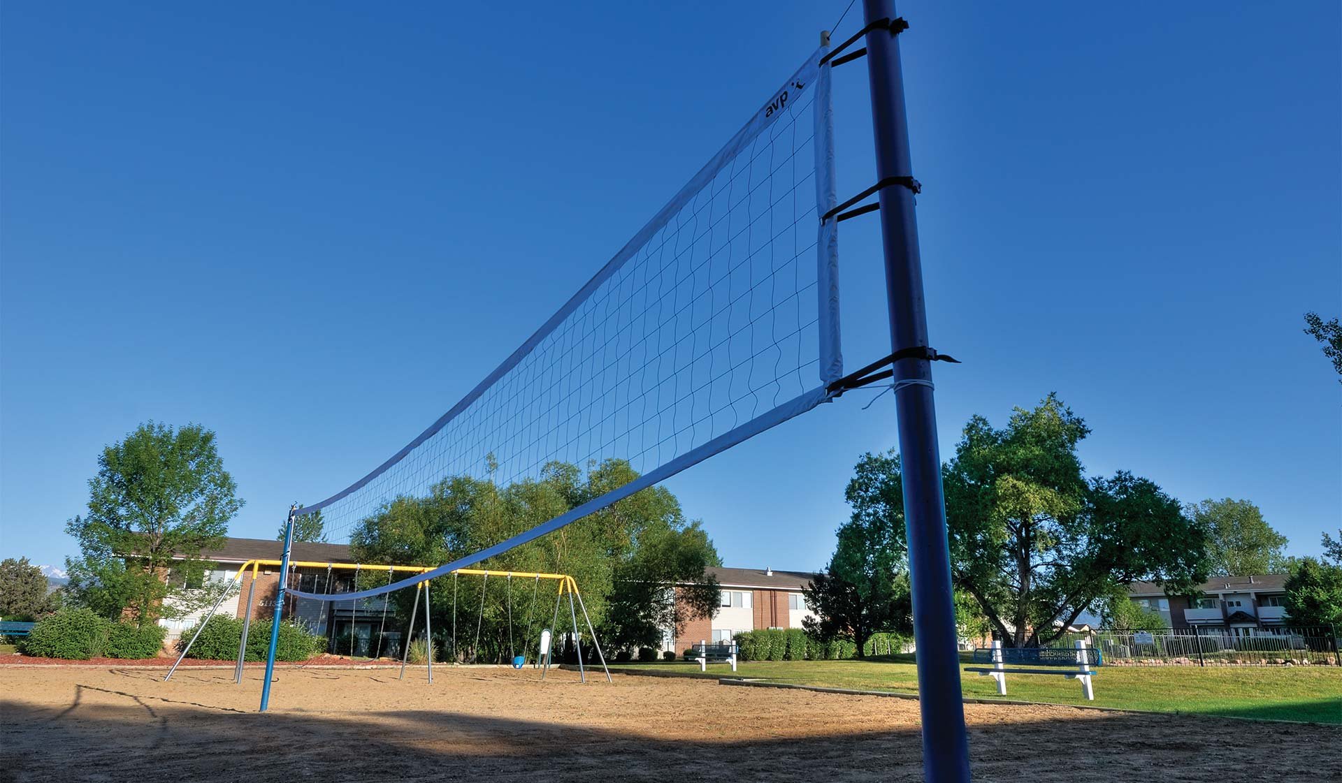 Play a game of sand volleyball 