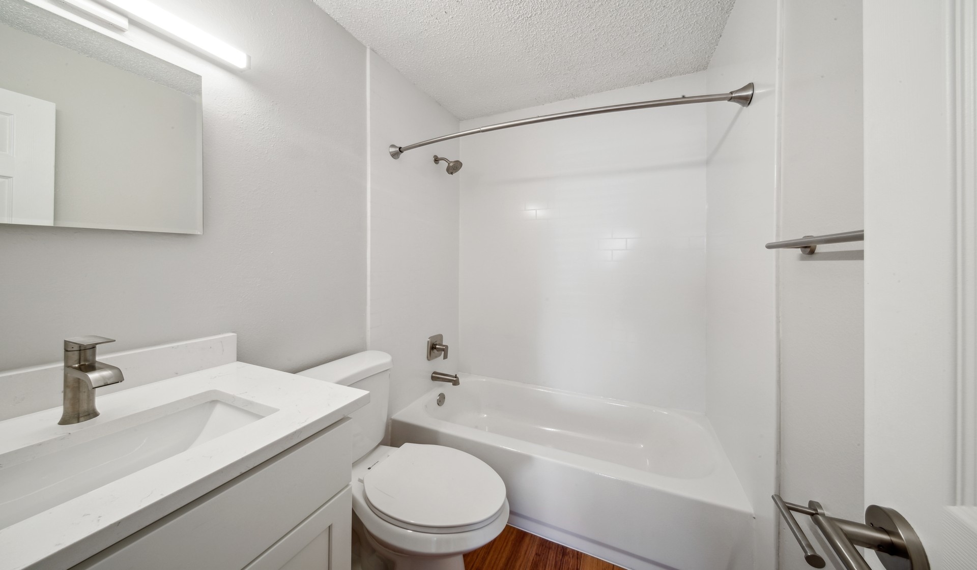 New bathrooms with quartz countertops and new fixtures 